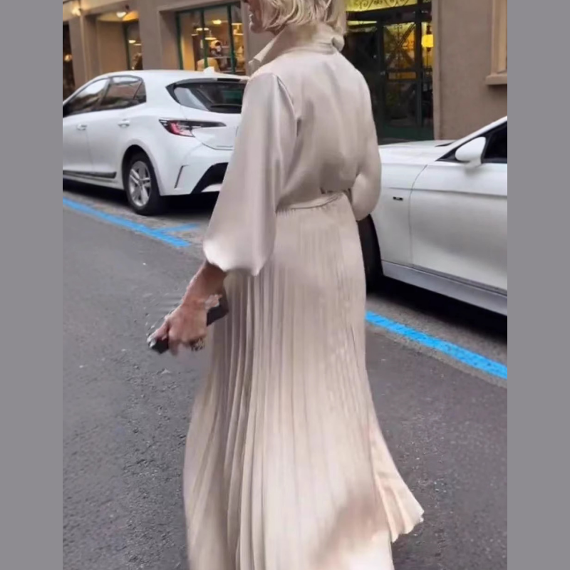 Elegant Pleated Maxi Dress with Floral Waist Detail