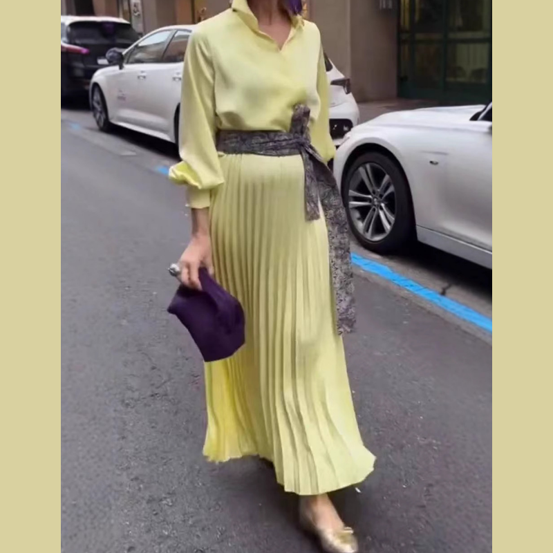 Elegant Pleated Maxi Dress with Floral Waist Detail